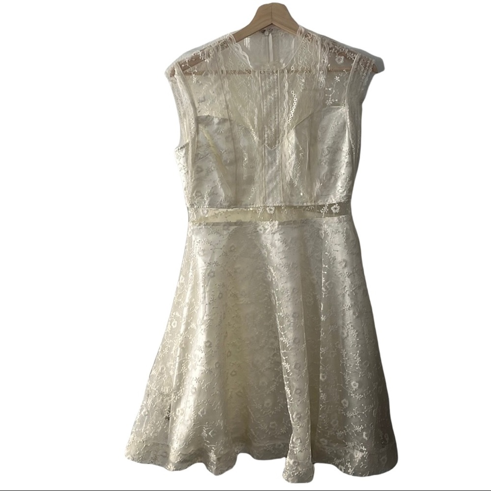 Floral lace peek-a-boo dress